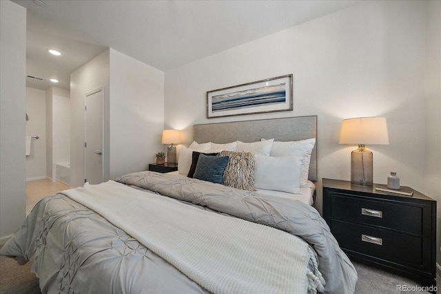 1841 S Dunkirk St Unit 203, Aurora, CO 80017 - bedroom featuring recessed lighting and light carpet