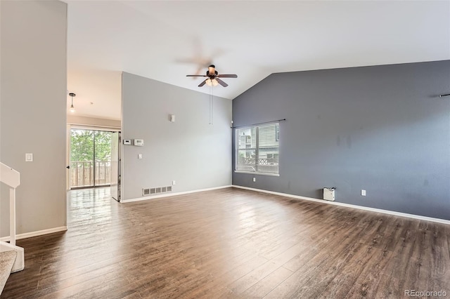 18984 E Kent Cir, Aurora, CO 80013 - spare room with a ceiling fan, wood finished floors, lofted ceiling, and baseboards
