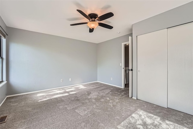 18984 E Kent Cir, Aurora, CO 80013 - unfurnished bedroom with carpet floors, a closet, baseboards, and a ceiling fan