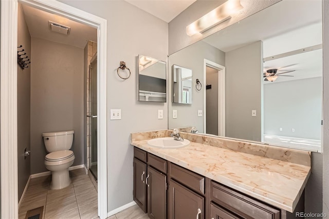 18984 E Kent Cir, Aurora, CO 80013 - full bathroom with vanity, toilet, tile patterned floors, and a stall shower