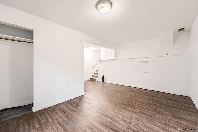 18984 E Kent Cir, Aurora, CO 80013 - below grade area featuring wood finished floors, stairs, and baseboards