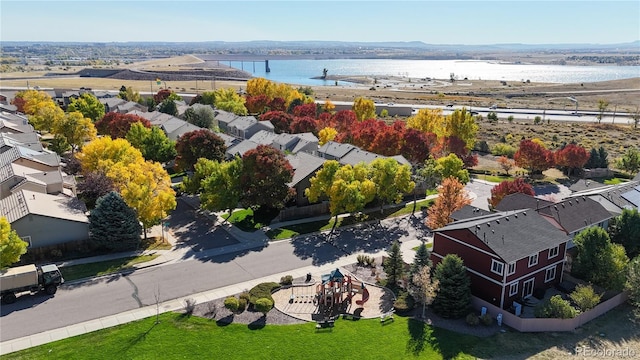 aerial view with a residential view and a water view