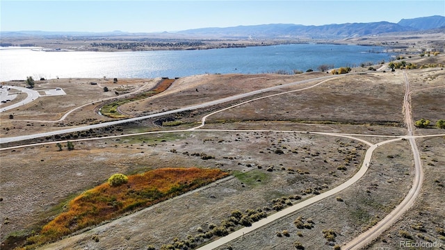 aerial view with a water and mountain view