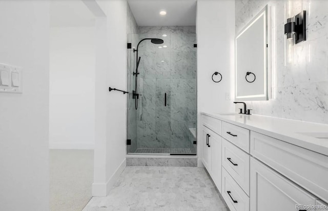 2361 Junegrass Ln, Superior, CO 80027 - bathroom with a marble finish shower, double vanity, baseboards, recessed lighting, and marble finish flooring