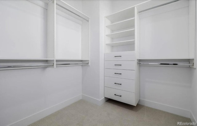 2361 Junegrass Ln, Superior, CO 80027 - walk in closet featuring light carpet