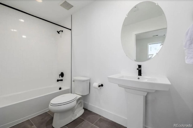 2361 Junegrass Ln, Superior, CO 80027 - bathroom with toilet, tub / shower combination, tile patterned flooring, and baseboards