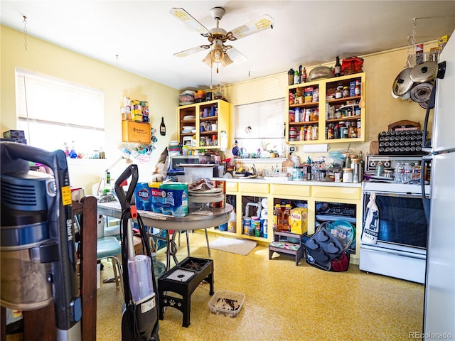 interior space featuring a ceiling fan