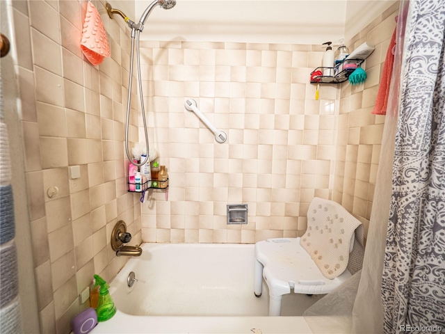 bathroom featuring shower / bath combination with curtain