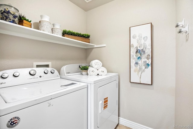clothes washing area with laundry area and washing machine and dryer