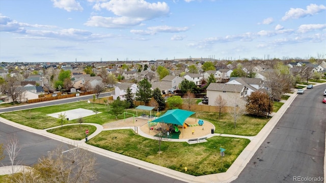 birds eye view of property with a residential view
