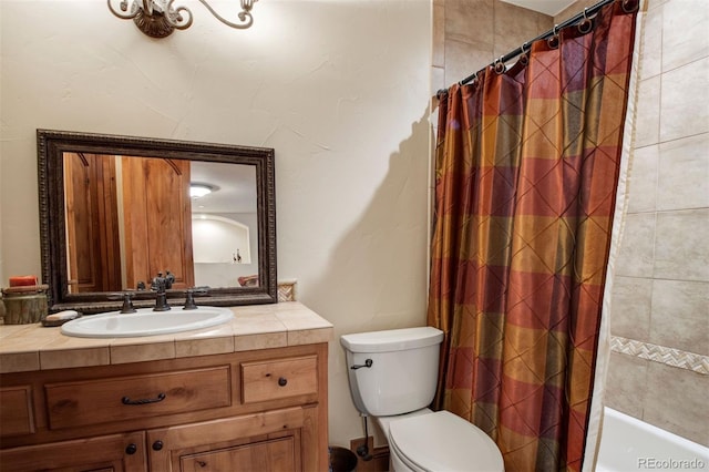 full bathroom featuring vanity, toilet, and shower / bath combo with shower curtain