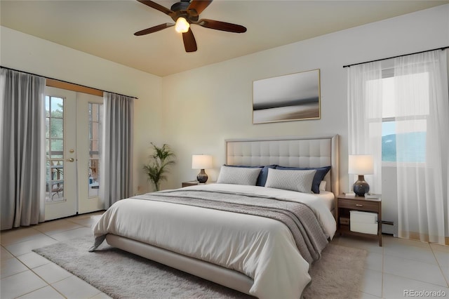 tiled bedroom featuring french doors, ceiling fan, access to exterior, and multiple windows