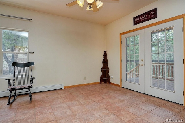 doorway featuring baseboard heating, french doors, and ceiling fan