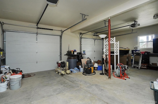 garage featuring a garage door opener