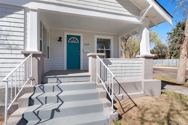 1130 E Yampa St, Colorado Springs, CO 80903 - view of exterior entry with a porch