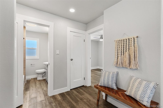 1130 E Yampa St, Colorado Springs, CO 80903 - mudroom featuring baseboards and wood finished floors
