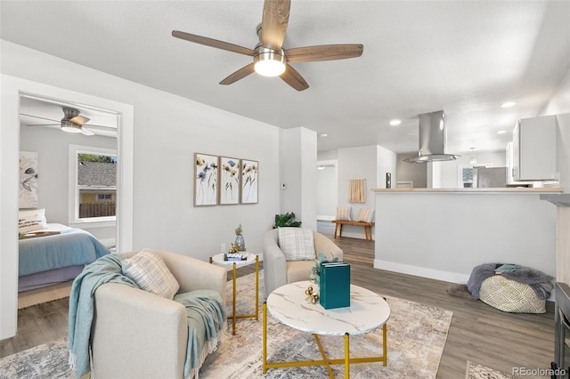 1130 E Yampa St, Colorado Springs, CO 80903 - living area with ceiling fan, light wood-style floors, and recessed lighting