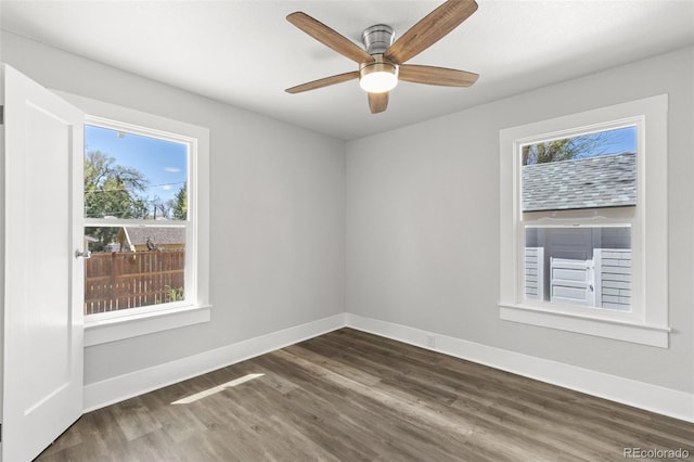 1130 E Yampa St, Colorado Springs, CO 80903 - spare room featuring wood finished floors, a ceiling fan, and baseboards