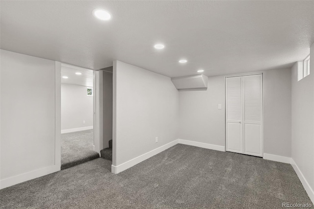 1130 E Yampa St, Colorado Springs, CO 80903 - finished basement featuring dark carpet, baseboards, and recessed lighting