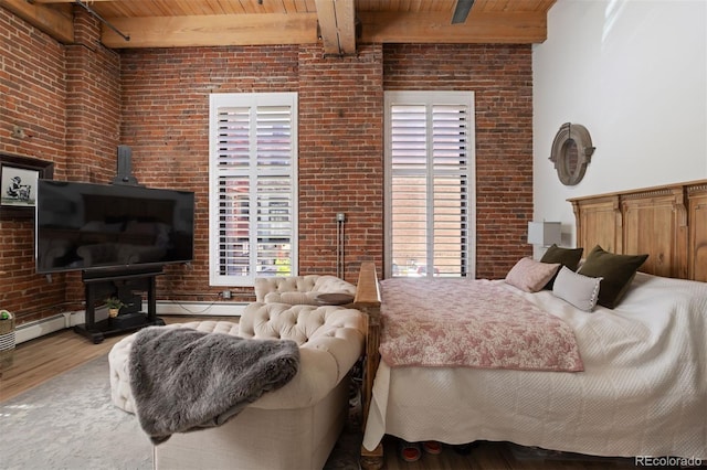 bedroom featuring beamed ceiling, wood ceiling, brick wall, and wood-type flooring