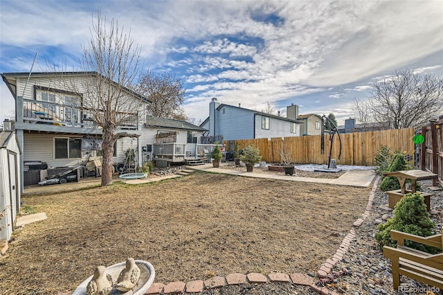 view of yard with a deck