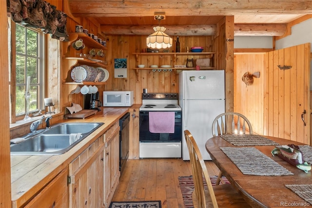 987 Boreas Cir, Jefferson, CO 80456 - kitchen with white appliances, open shelves, wood walls, a wooden ceiling with exposed beams, and plenty of natural light
