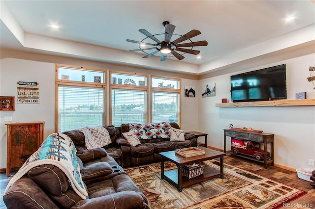 42919 Vista Rdg, Parker, CO 80138 - living room featuring ceiling fan, plenty of natural light, a tray ceiling, wood finished floors, and recessed lighting