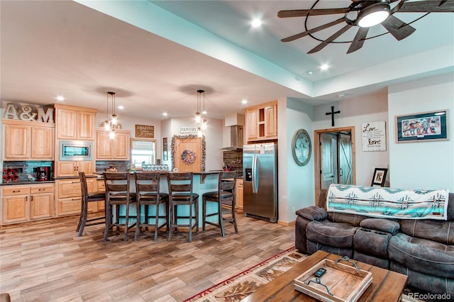 42919 Vista Rdg, Parker, CO 80138 - living room with recessed lighting, a ceiling fan, and light wood-type flooring