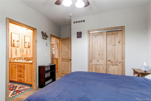 42919 Vista Rdg, Parker, CO 80138 - bedroom with a closet, ceiling fan, ensuite bathroom, and light carpet