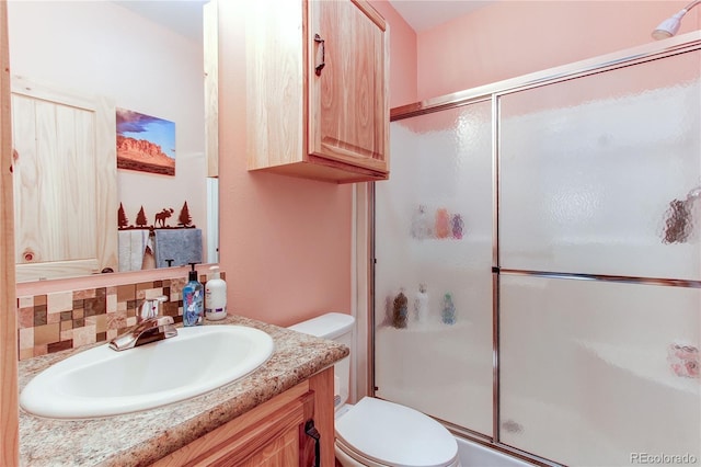 42919 Vista Rdg, Parker, CO 80138 - bathroom featuring a shower stall, vanity, and tasteful backsplash