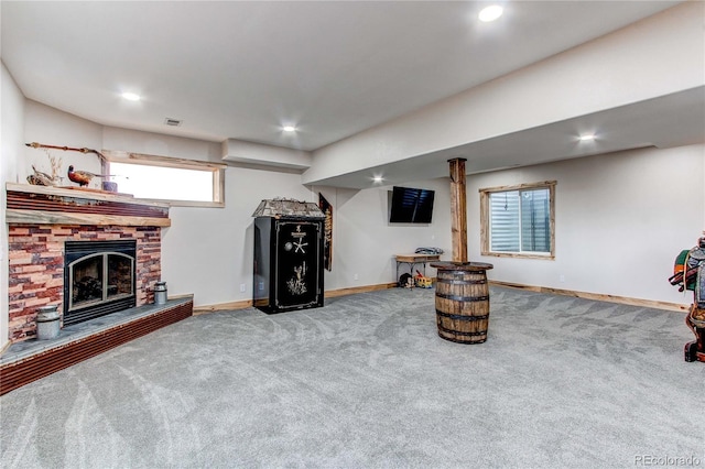 42919 Vista Rdg, Parker, CO 80138 - living area featuring carpet floors, recessed lighting, and a fireplace with raised hearth