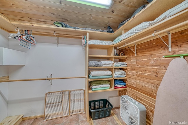 walk in closet featuring light tile patterned floors