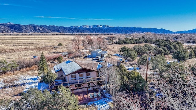 bird's eye view with a mountain view