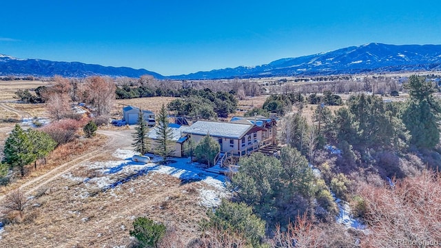 drone / aerial view featuring a mountain view