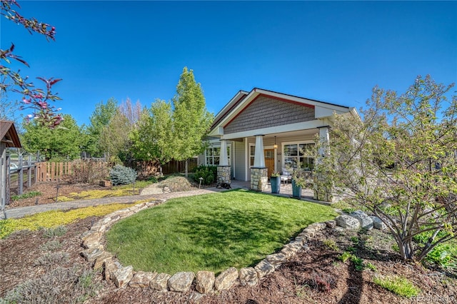 322 W Park Ave, Salida, CO 81201 - back of house with a porch and stone siding