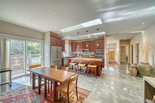 322 W Park Ave, Salida, CO 81201 - dining space with a skylight and recessed lighting
