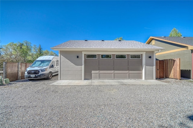 322 W Park Ave, Salida, CO 81201 - view of front of home featuring a garage and roof with shingles