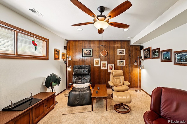 7590 E Easter Pl, Centennial, CO 80112 - sitting room with wooden walls, a ceiling fan, recessed lighting, baseboards, and light carpet