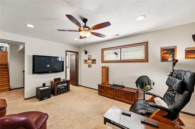 7590 E Easter Pl, Centennial, CO 80112 - living area with baseboards, ceiling fan, light carpet, recessed lighting, and stairway