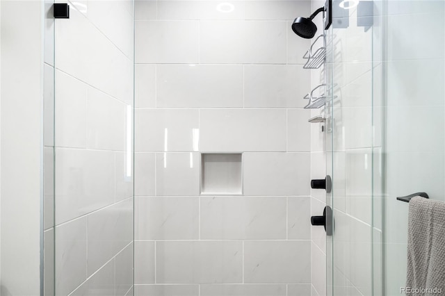 bathroom featuring a shower stall