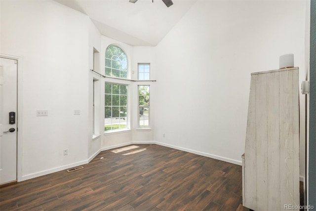 20445 Mitchell Pl, Denver, CO 80249 - spare room featuring high vaulted ceiling, dark wood finished floors, and ceiling fan