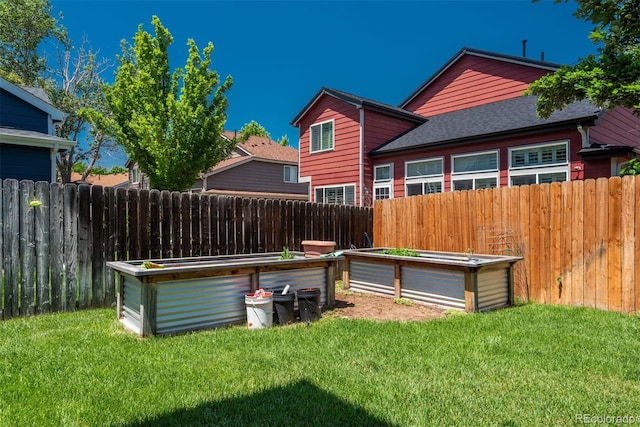 20445 Mitchell Pl, Denver, CO 80249 - fenced backyard with a garden