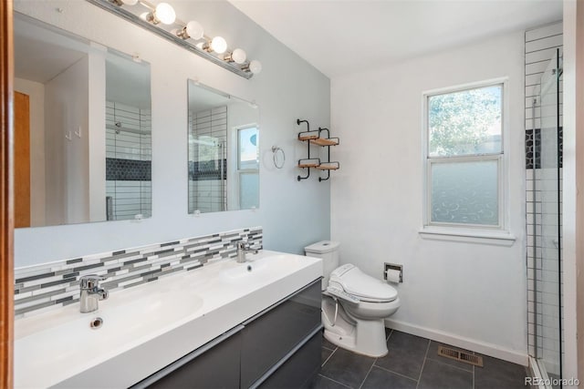 20445 Mitchell Pl, Denver, CO 80249 - bathroom featuring a stall shower, tile patterned flooring, and double vanity