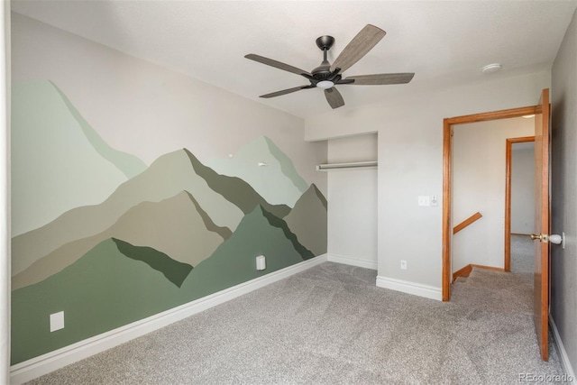 20445 Mitchell Pl, Denver, CO 80249 - unfurnished bedroom featuring carpet flooring, a closet, and a ceiling fan