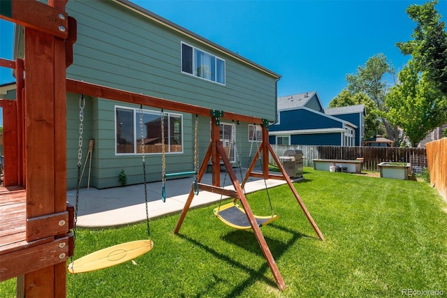 20445 Mitchell Pl, Denver, CO 80249 - rear view of property with a patio and a fenced backyard