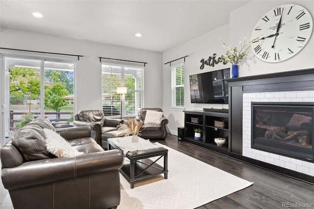 1867 W 137th Ln, Broomfield, CO 80023 - living room with wood finished floors, recessed lighting, and a brick fireplace
