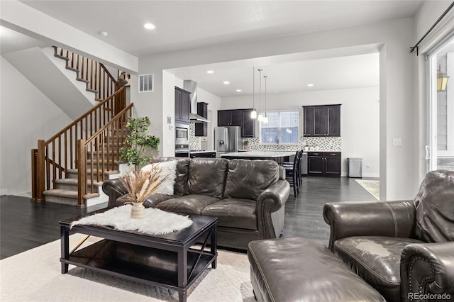 1867 W 137th Ln, Broomfield, CO 80023 - living room with wood finished floors, stairs, and recessed lighting