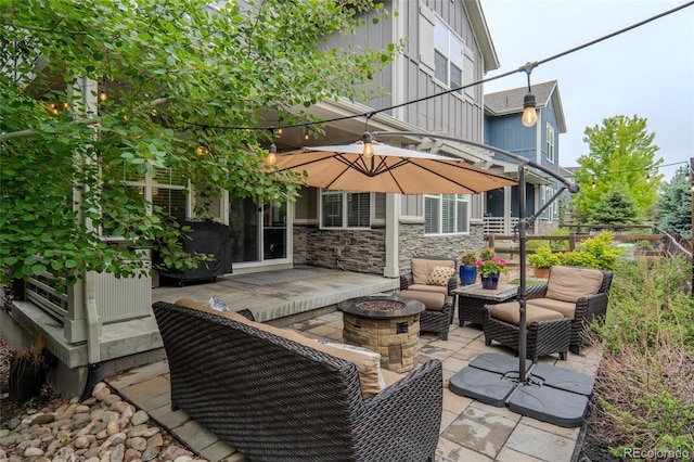 1867 W 137th Ln, Broomfield, CO 80023 - view of patio / terrace featuring an outdoor living space with a fire pit