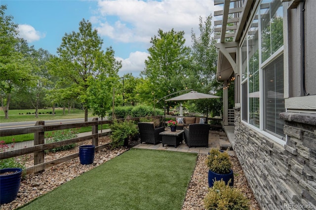 1867 W 137th Ln, Broomfield, CO 80023 - view of yard with an outdoor hangout area, a patio area, and view of wooded area