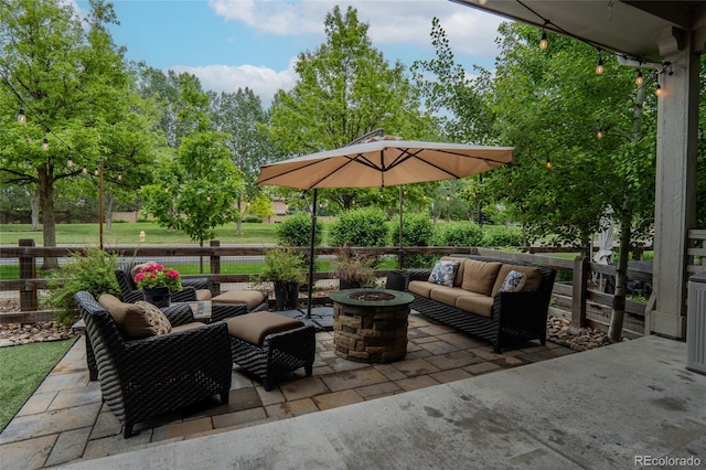 1867 W 137th Ln, Broomfield, CO 80023 - view of patio / terrace featuring an outdoor living space with a fire pit